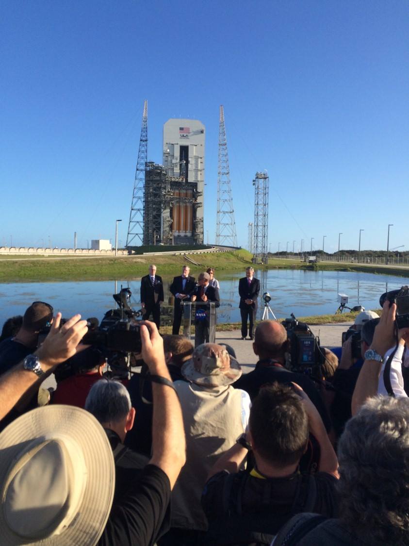 NASA Administrator Charlie Bolden addressing media at SLC-37 with Orion atop a ULA Delta IV Heavy rocket. Orion ready for launch