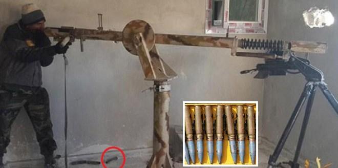 An ISIS fighter aims the giant 10 foot long sniper gun out of a window in Kobane. (inset): An image of the 23 mm bullet that is fired from the ISIS gun show in the pic.