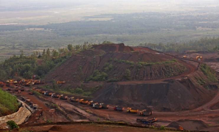 Trucks lined up to collect iron ore in the south of India