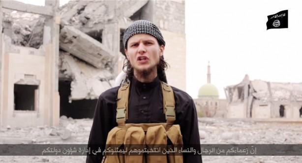 ISIS propaganda video shows Ottawa extremist John Maguire scolding the government for joining the international military coalition fighting the terrorist group and warns that Canadians would be indiscriminately targeted by them. John Maguire in ISIS propaganda video