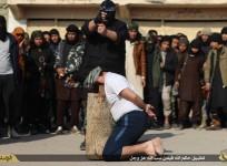 Young ISIS recruits from 'cub' camps watched in horror as the accused man was beheaded by the executioner.