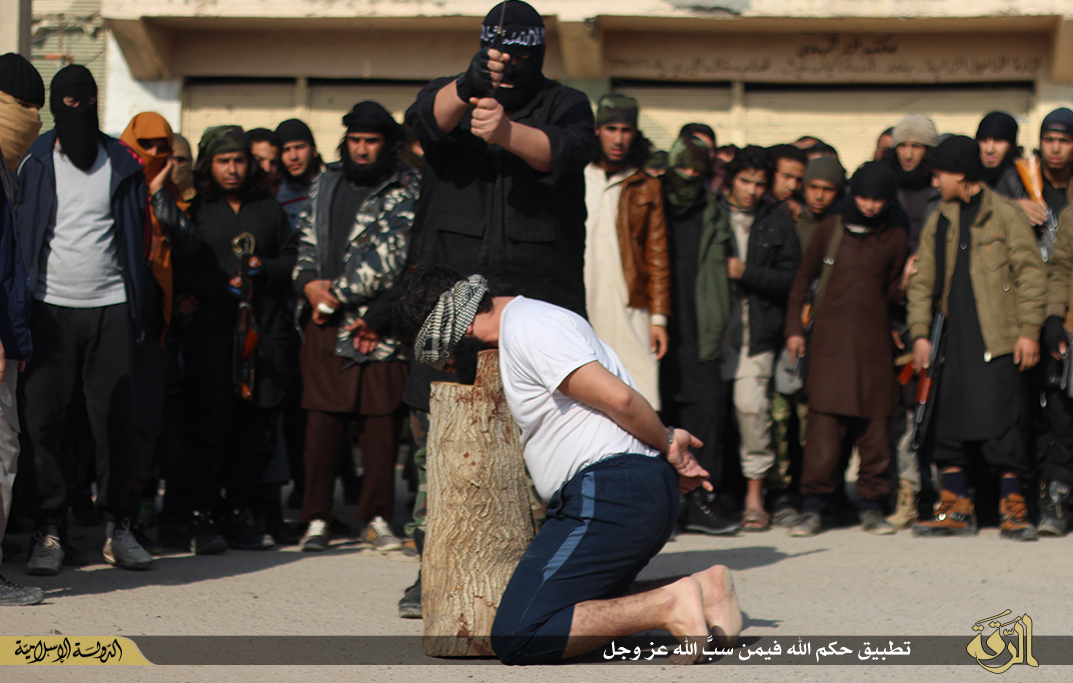 Young ISIS recruits from 'cub' camps watched in horror as the accused man was beheaded by the executioner.