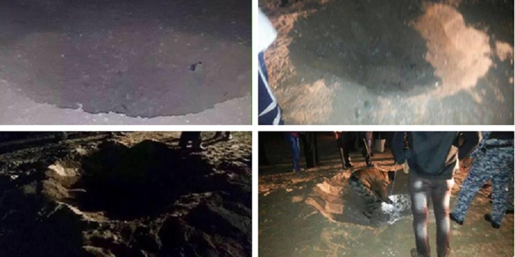 Iraqi security personnel inspect a site after an ISIS mortar attack in Karbala.