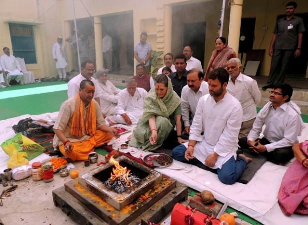 Pujari Sonia: Sonia Gandhi and Rahul Gandhi perform a religious ritual before Sonia filed her nomination for the general election at Rae Bareli in Uttar Pradesh. Sonia Gandhi and Rahul Gandhi
