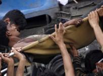 An injured passenger being moved from an overturned carriage of a train. Representative image. Reuters file