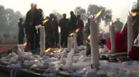 pakistanis-pray-resolve-to-return-to-stricken-school