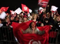 Nidaa Tounes (Call for Tunisia) supporters wave flags and shout slogans