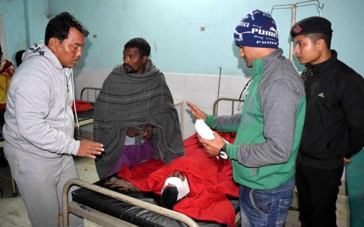 A victim of Bodo militants' indiscriminate firings in Kokrajhar district being treated at an hospital in Kokrajhar on 23 December 2014. Assam Attacks