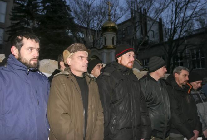 Ukrainian prisoners of war get ready to be transported for an exchange for members of pro-Russian separatists in Donetsk December 26, 2014. Ukrainian prisoners of war get ready to be transported for an exchange for members of pro-Russian separatists in Donetsk December 26, 2014.