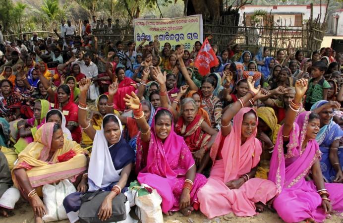 Demonstrators shout slogans during a protest against land acquisition at Gobindpur village in Jagatsinghpur district, in the eastern Indian state of Odisha, February 7, 2013. Land acquisition protest 2