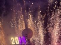 Fireworks explode past the Times Square Ball after it dropped to signal the start of the new year in Times Square, Midtown, New York January 1, 2014.