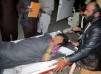 A wounded Afghan girl is rushed to a hospital in Helmand province December 31, 2014.