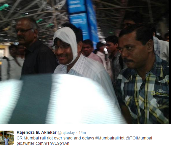 An injured rail driver being escorted out of the the railway station on Friday. An injured rail driver being escorted out of the the railway station on Friday.