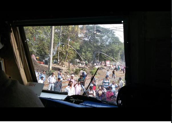 Angry commuters pelted stones and destroyed public property Angry commuters pelted stones and destroyed public property