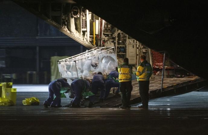 UK's Ebola-hit nurse is put on a Hercules transport plane at Glasgow Airport in Scotland December 30, 2014, to be transported to London. Ebola patient quarentine