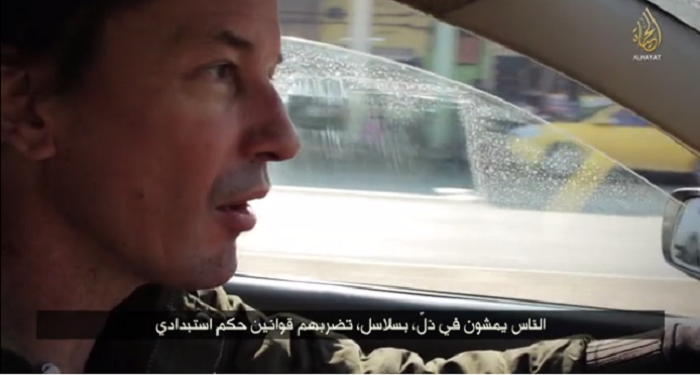 John Cantlie drives a car through Mosul