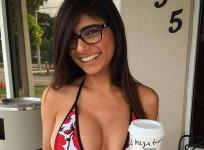 Mia Khalifa drinks Starbuck coffee in a bikini