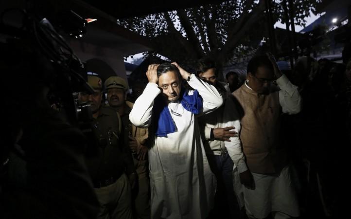Shashi Tharoor after performing the last rites for his wife Sunanda Puskhar at a cremation ground in New Delhi on 18 January, 2014. Shashi Tharoor
