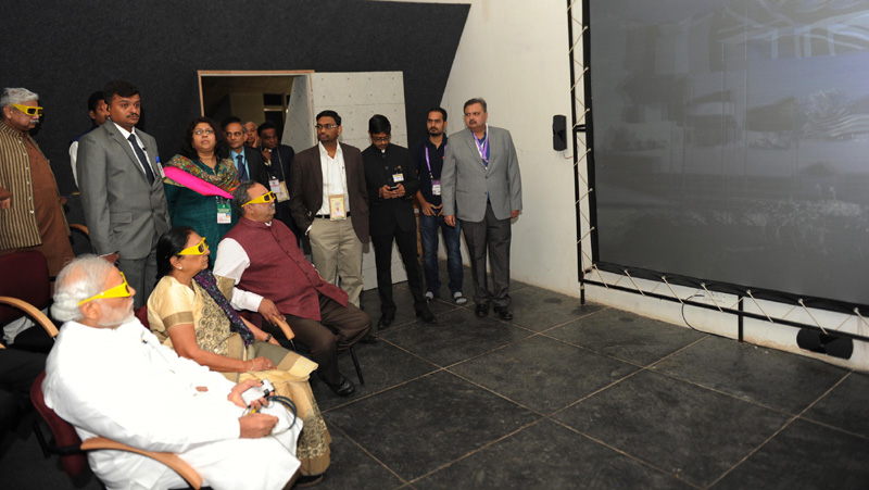 The Prime Minister, Shri Narendra Modi watching the Exhibition of Dandi Kutir in Mahatma Temple premises, Gandhinagar on January 08, 2015. 2015 Pravasi Bharatiya Divas