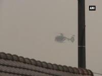 helicopters-over-town-where-paris-attack-suspects-last-seen