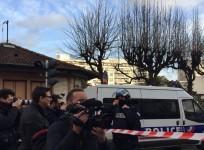 French police blocks the roads near a kosher grocery store as a terrorist militant holds several hostages in the store, in Porte de Vincennes, eastern Paris, on Jan. 9, 2015. French President Francois Hollande confirmed Friday night four hostages were kil