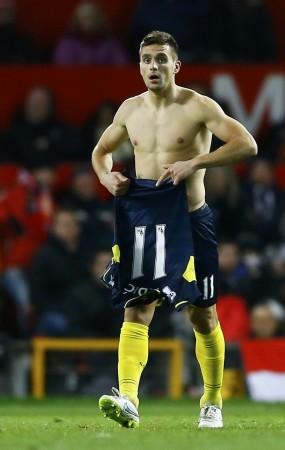 Southampton's Dusan Tadic removes his shirt as he celebrates his goal against Manchester United at Old Trafford Tadic