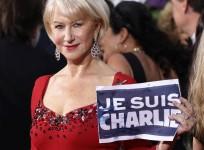Actress Helen Mirren holds a
