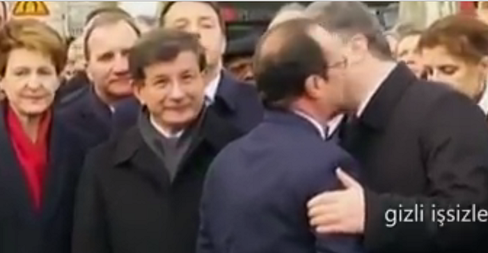 French President Francois Hollande went around hugging all the world leaders but when it came to the Turkish Prime Minister Ahmet Davutoglu he quickly gave a curt handshake and moved on. French President Francois Hollande went around hugging all the world leaders but when it came to the Turkish Prime Minister Ahmet Davutoglu he quickly gave a curt handshake and moved on.