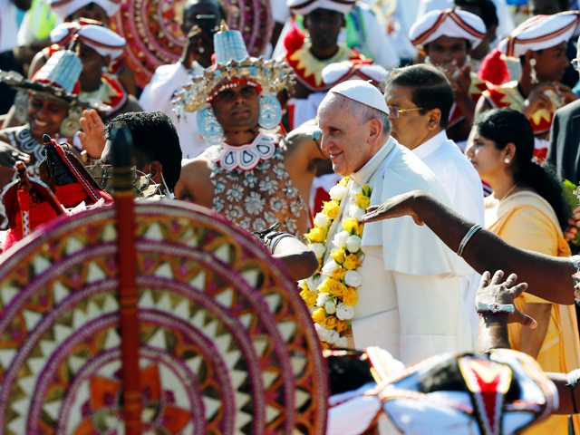 Pope Francis is greeted as he arrives at the Colombo airport. Pope Francis in Sri Lanka