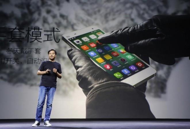 Lei Jun, founder and chief executive officer of China's mobile company Xiaomi Inc, introduces the new features of Xiaomi Phone MI 4 Lei Jun, founder and chief executive officer of China's mobile company Xiaomi Inc, introduces the new features of Xiaomi Phone MI 4