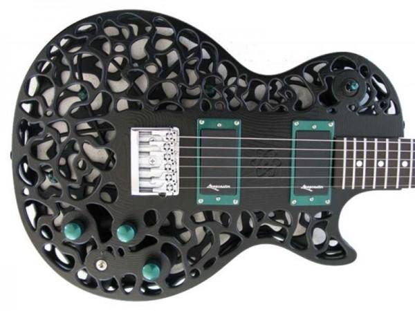 Atom, a 3D Printed Guitar Atom, a 3D Printed Guitar