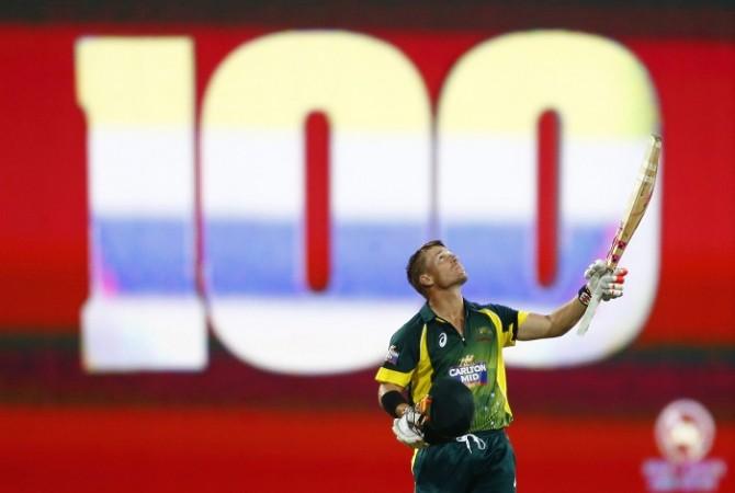 David Warner looks to the heavens after completing a hundred in the first match of the tri-series against England David Warner Australia