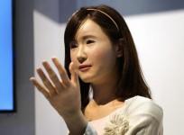 ChihiraAico, a communication android robot, gestures to show goers at the Toshiba booth at the International Consumer Electronics show