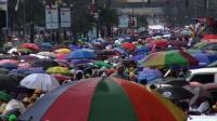 pope-celebrates-mass-with-millions-in-wet-philippines
