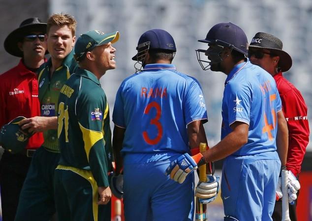 David Warner has a go at Rohit Sharma during their tri-series match David Warner Australia Rohit Sharma India Suresh Raina James Faulner Kumar Dharmasena