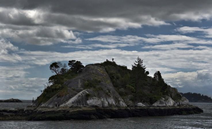 Asmall island inside a cove in West Vancouver, British Columbia. When the next megathrust quake hits, Earth with rip open like a zipper, says expert Vancouver Island