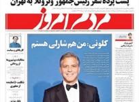 An Iranian daily has been banned for carrying a photo of George Clooney wearing 'I am Charlie' on its cover page.