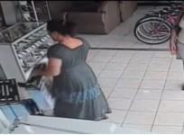 woman walks out with plasma tv up her dress