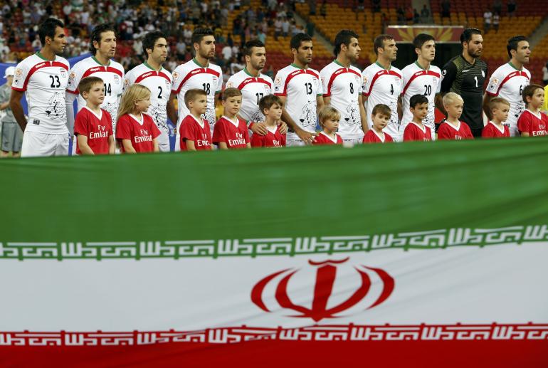 Iran's players line up for the national anthems before the start of their Asian Cup Group C soccer match against UAE at the Brisbane Stadium Iran's players line up for the national anthems before the start of their Asian Cup Group C soccer match against UAE at the Brisbane Stadium