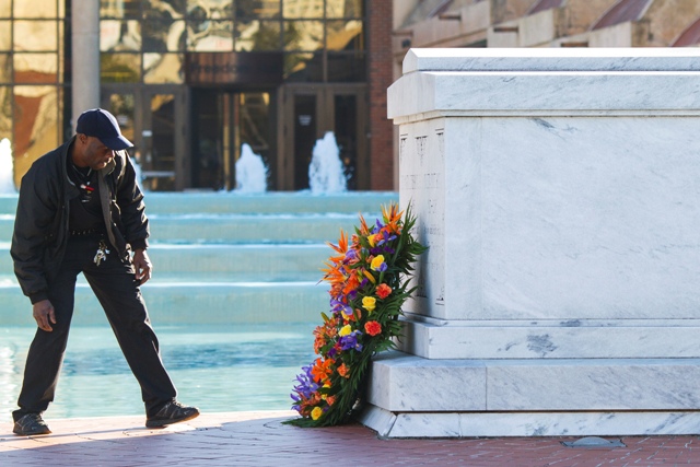 King Center employee Jade Dowd places a wreath at the crypt of Dr. Martin Luther King Jr. and his wife Coretta Scott King prior to The King Center's 47th Annual Martin Luther King Jr. Commemorative Service in Atlanta. Martin Luther King Jr. Day