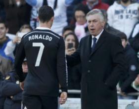 After receiving a red card, Ronaldo walks past Real Madrid manager, Carlo Ancelotti Cristiano Ronaldo