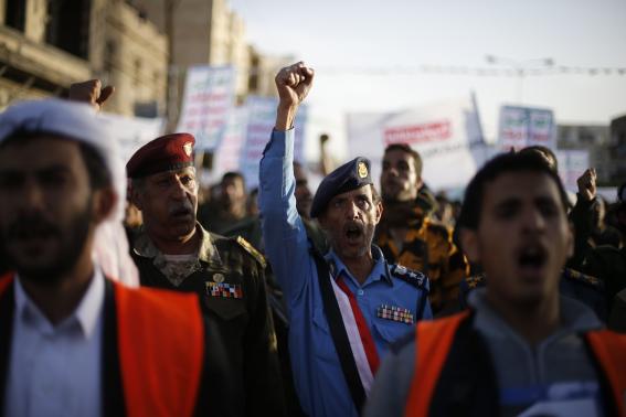 Army and police officers loyal to the Houthi movement shout slogans as they take part in a demonstration to show support to the movement in Sanaa January 23, 2015. Army and police officers loyal to the Houthi movement shout slogans as they take part in a demonstration to show support to the movement in Sanaa January 23, 2015.