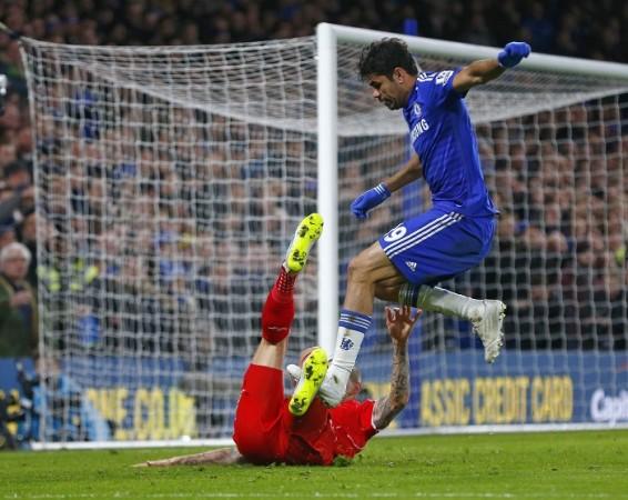 Chelsea's Diego Costa (top) appears to stamp on Liverpool's Martin Skrtel during their English League Cup semi-final second leg match at Stamford Bridge Diego Costa