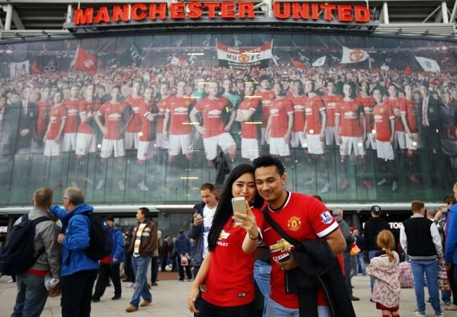 Manchester United season-ticket holders face a one-game ban if they do not buy tickets for the Red Devils' FA Cup replay fixture against Cambridge United on 4 February Manchester United