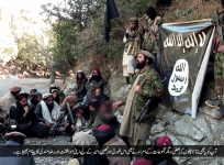 Sheikh Abu Omar Maqbool, a former spokesman for the Pakistani Taliban, pledges allegiance to the Islamic State in this still from a video released by an Islamic State media wing