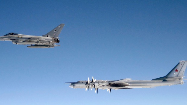 A British RAF Typhoon shadows a Russian Bear-H bomber