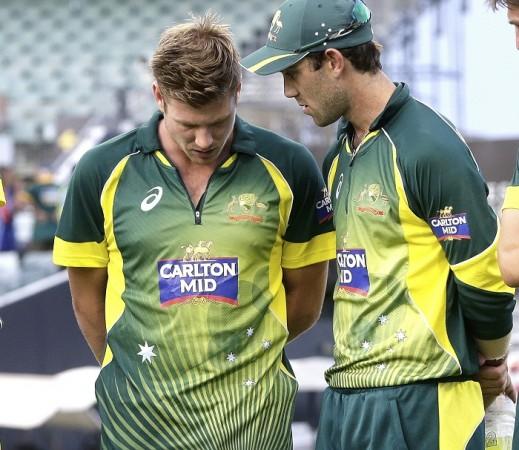 Australia all-rounder James Faulkner (L) was forced off the field with a side strain during the tri-series final against England James Faulkner Glenn Maxwell Australia