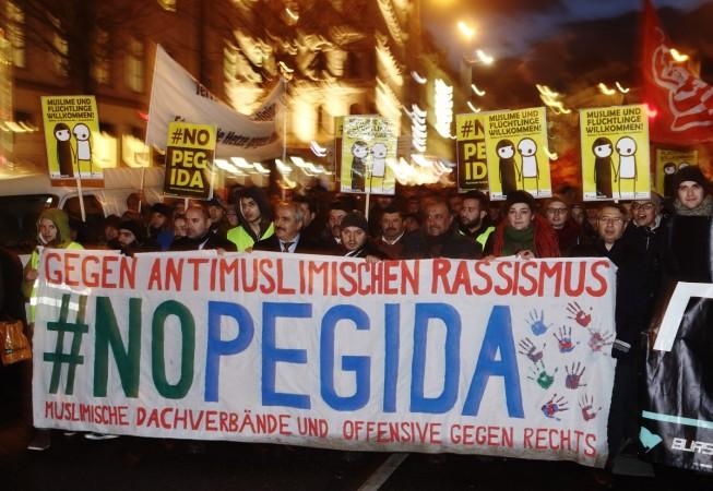 Anti-Patriotic Europeans Against the Islamisation of the West (PEGIDA) demonstrators gather during a demonstration in Vienna February 2, 2015. Nazi Saluts during PEGIDA march