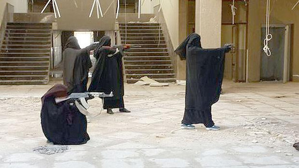 British twin sisters,who last year fled to Syria to join ISIS,posted an image on Twitter,showing a military drill.