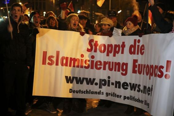 People take part in a march of a grass-roots anti-Muslim movement in Germany.